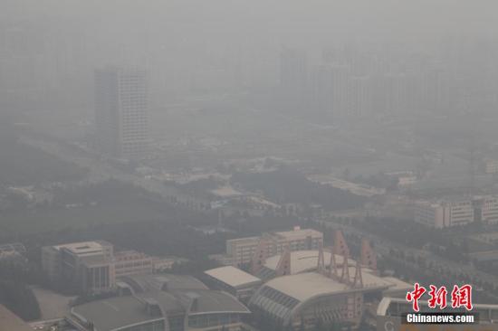 资料图：2014年10月10日，西安连续3天遭遇雾霾空气重污染。<a target='_blank' href='http://www.chinanews.com/' _fcksavedurl='http://www.chinanews.com/'></table>中新社</a>发 彭华 摄 图片来源：CNSPHOTO